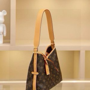 Alternative view of 🔥 M46203 CarryAll Small Handbag crafted from Monogram canvas with leather trim, making it the perfect companion for urban living. Its spacious design features a neatly organized interior, with a large inner pocket adding functional elements. The Monogram canvas zippered clutch is secured with a leather strap, measuring 29.0 x 24.0 x 12.0 cm (L x H x W).